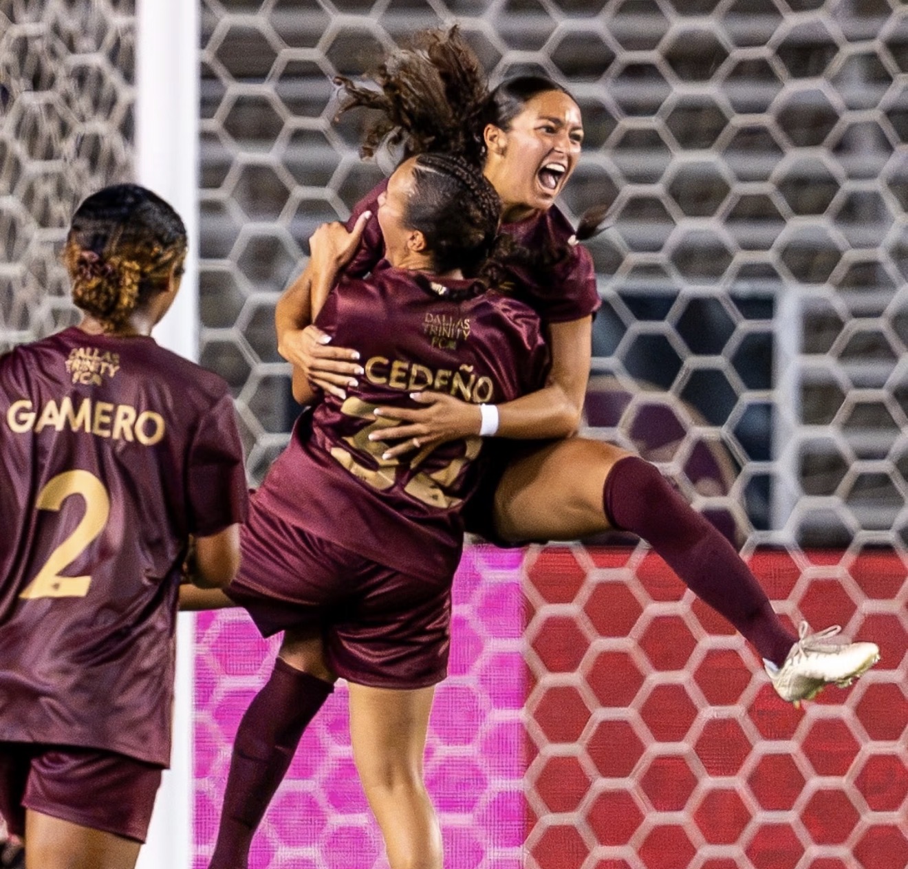 Seven Castain celebrating with her Dallas Trinity FC teammates